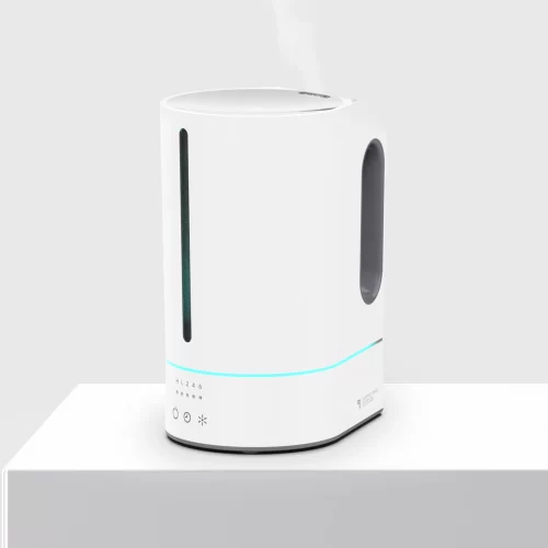 MIST 8 easy-fill ultrasonic humidifier on a white platform